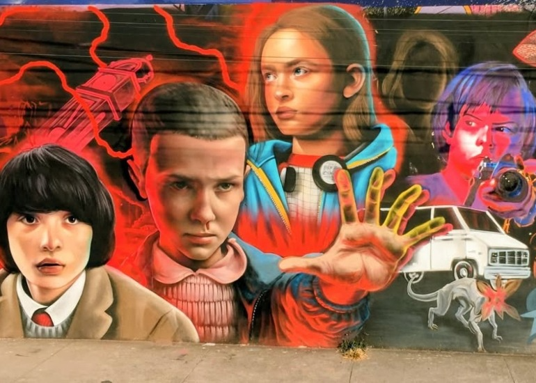 Imagen del artículo: Stranger Things dejó Netflix y ahora vive en los muros de León